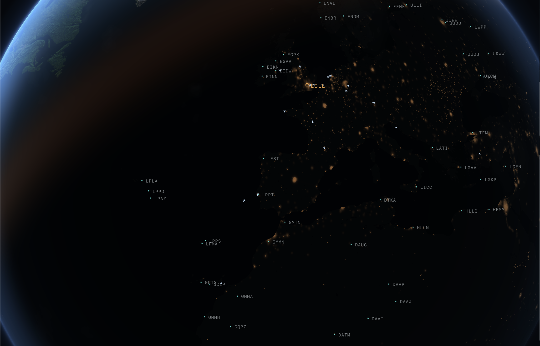 The night side from orbit over Europe and North Africa, the day-side terminator glowing at the left edge. A web of derived city lights with corridor strokes linking neighboring metros, the EGLL hub marked in amber, built from the game's own demand masters rather than a satellite texture.